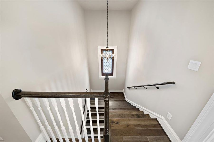 Up the stairs to the 2nd floor we go! Stained glass window provides natural light but maintains privacy!