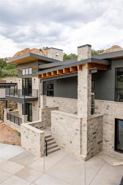 Enter from the ground-level garage or elevated front entrance