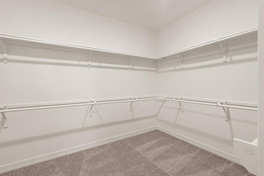 A view of your large primary walk-in Closet