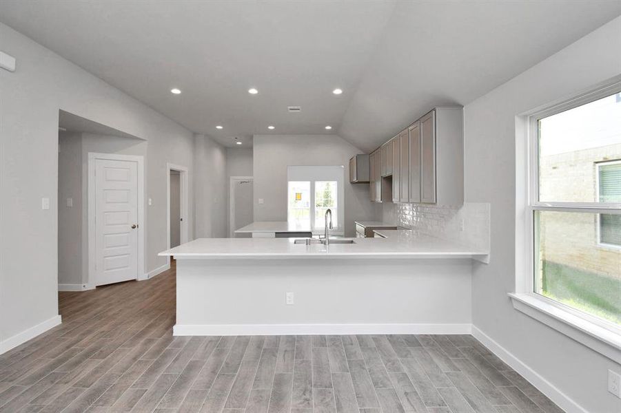 Another view of kitchen. Sample photo of completed home. As-built color and selections may vary.