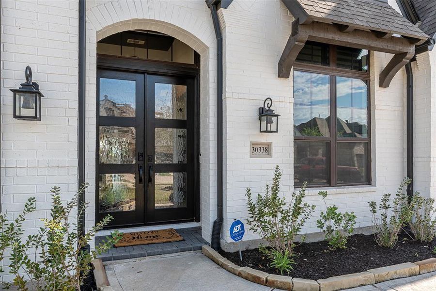 A very popular floor plan and classic white brick look rom Highland Homes.