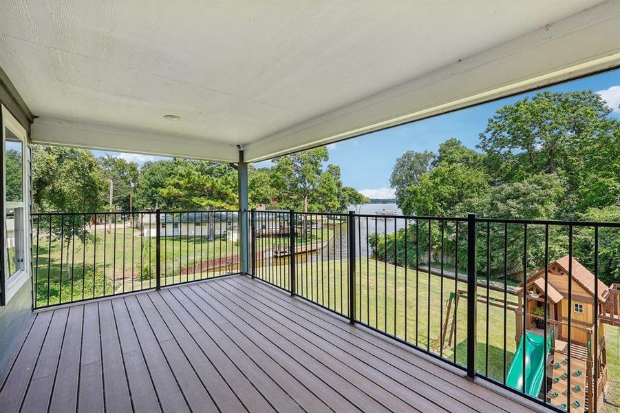 Wooden deck with a yard