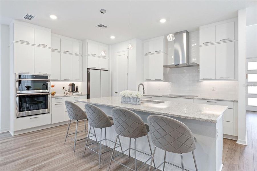 Chefs kitchen with quarts counters