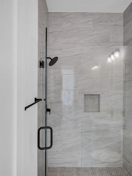 Bathroom featuring walk in shower