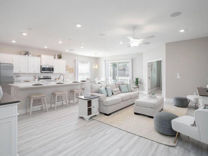 New homes include welcoming open-concept living space -  Shelby home plan by Highland Homes