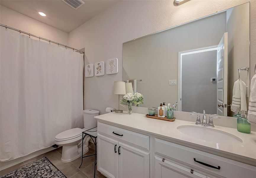 Lots of counter and cabinet space for shared morning routines. Also note the smart thermostat that can be controlled from your phone or alexa