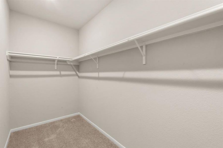 A view of your large primary walk-in Closet