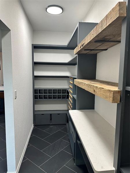 Custom built walk in pantry with wine storage