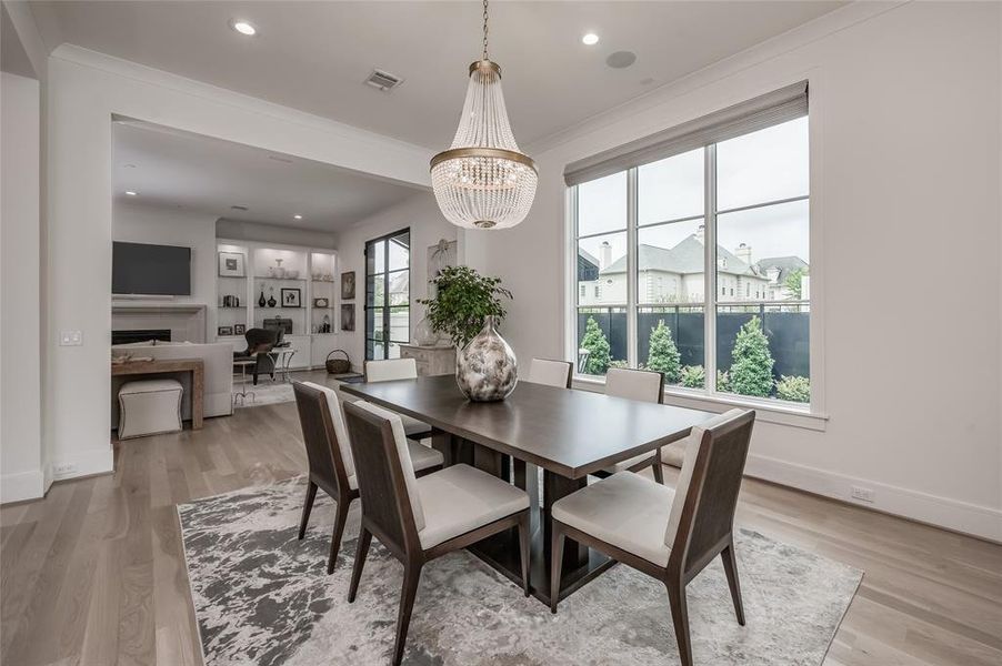 Another angle of the generously sized dining room, highlighting the easy flow of the downstairs floor plan.