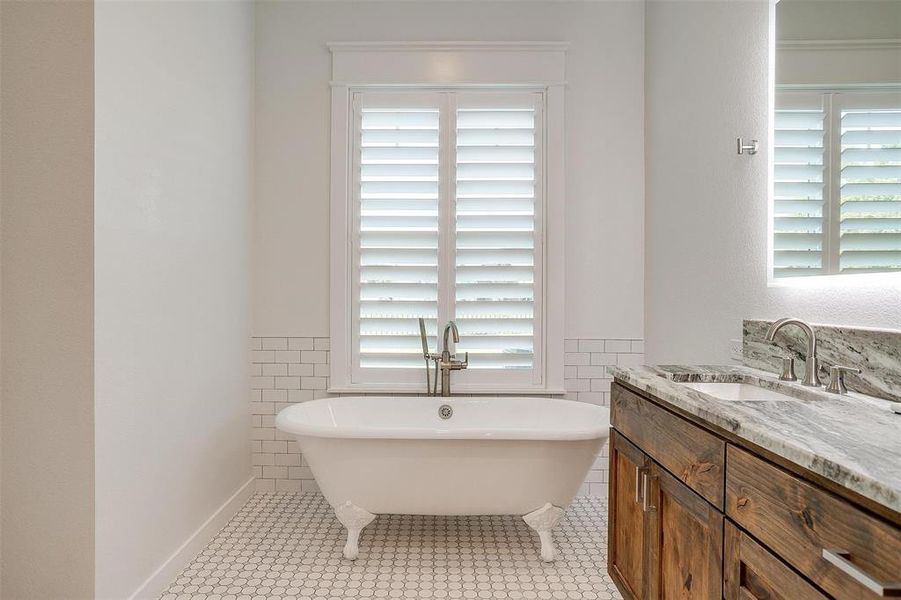 Master bathroom claw foot tub.