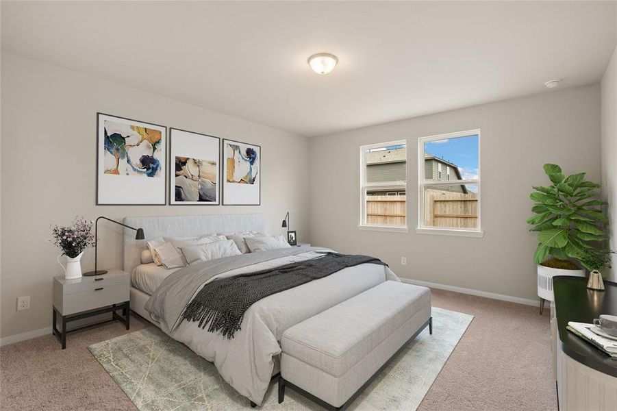 The primary bedroom is generously sized, creating a tranquil and spacious retreat that offers ample room for relaxation. Featuring plush carpet, high ceilings, fresh paint, and large windows that lets in natural lighting throughout the day.