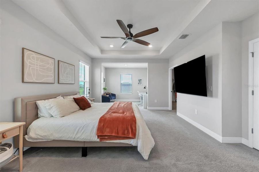 Master bedroom with sitting area.  TV mount for a late night show or movies in bed!