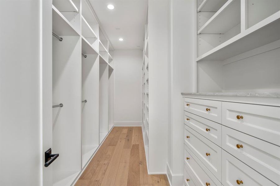 Second walk-in closet in this primary bedroom with ample storage and built-ins.