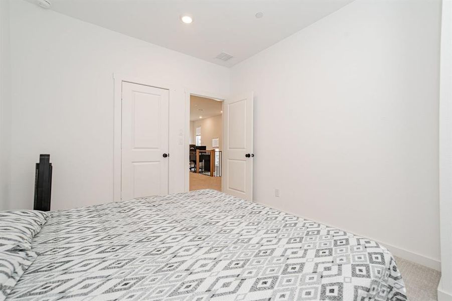 Bedroom featuring carpet flooring