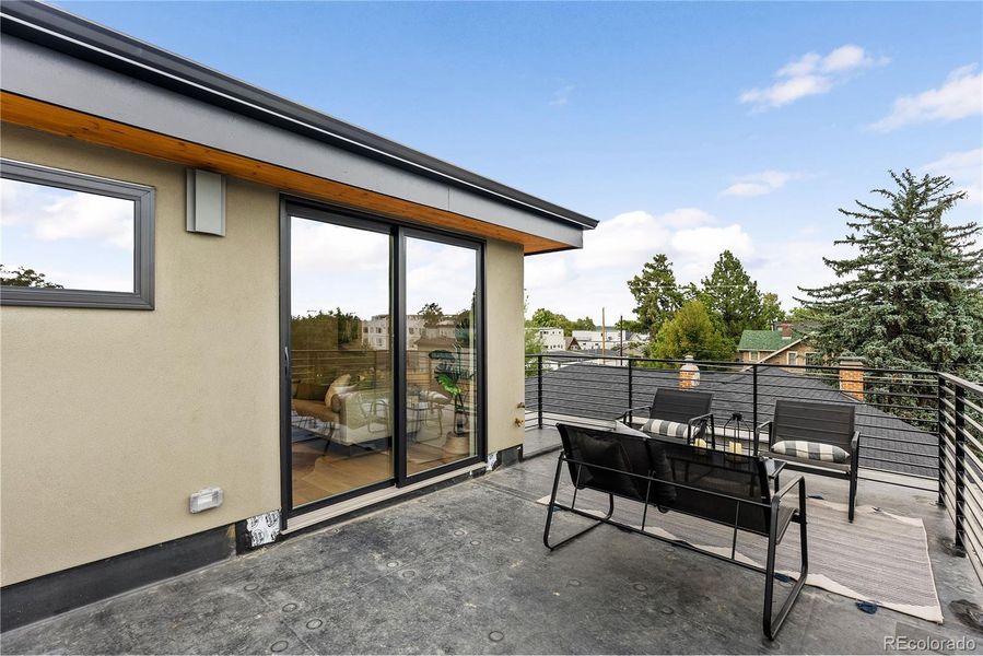 Step right out on to the stunning and oversized third floor deck (black rubber deck tiles to be installed).