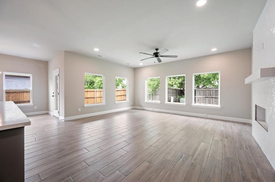 large living room with decorative windows