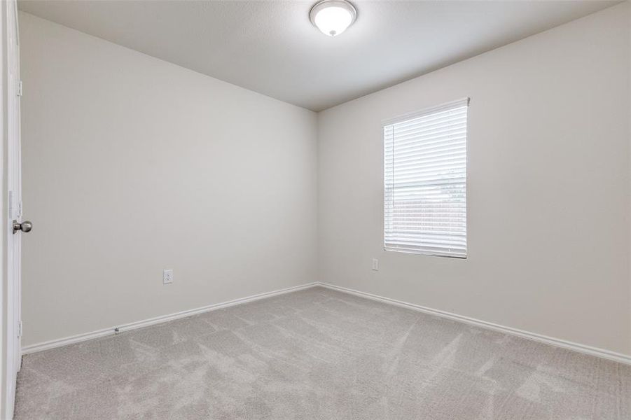 Unfurnished room with carpet floors