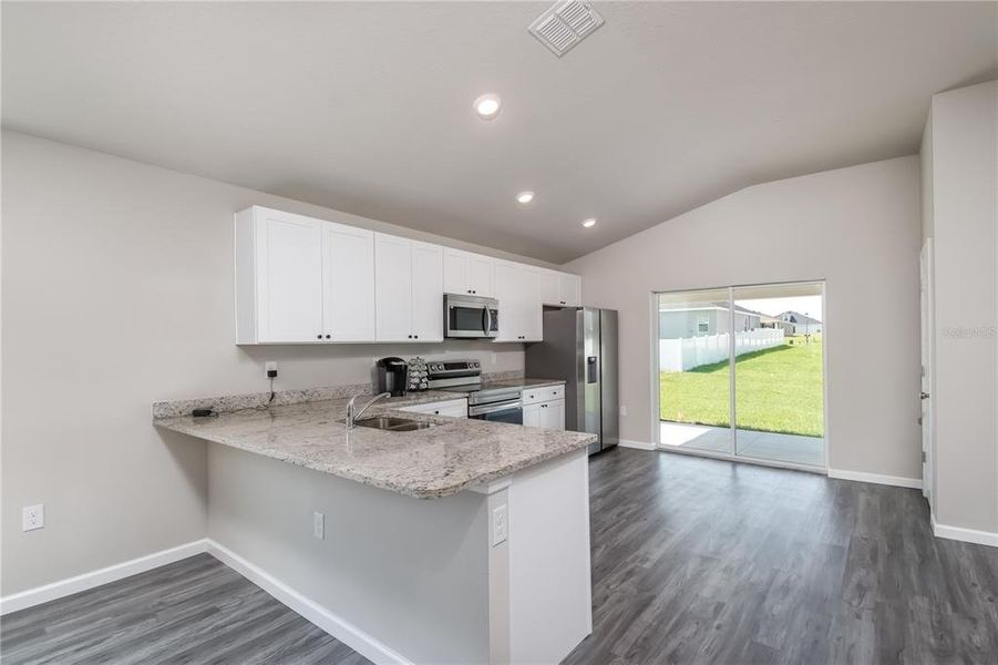 Kitchen with bar top