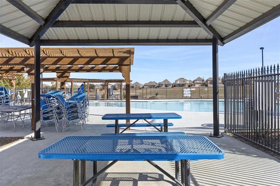 View of community patio / terrace featuring a gazebo, a pergola, and a community pool