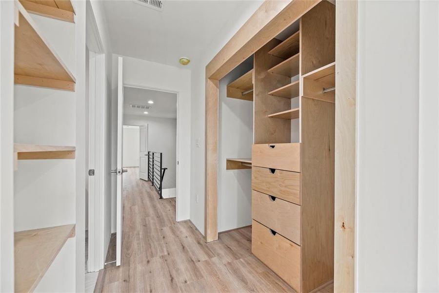 each of the bedrooms have thier own dedicated custom closet space along with built-in shelving.