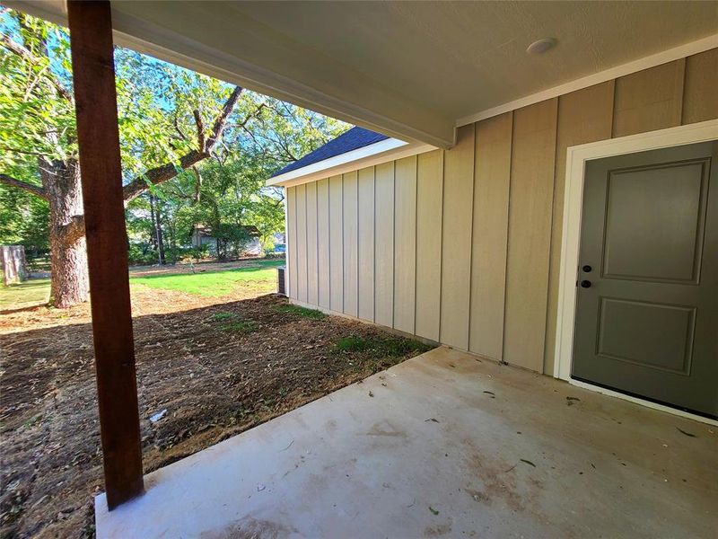 Covered Patio overlooking backyard