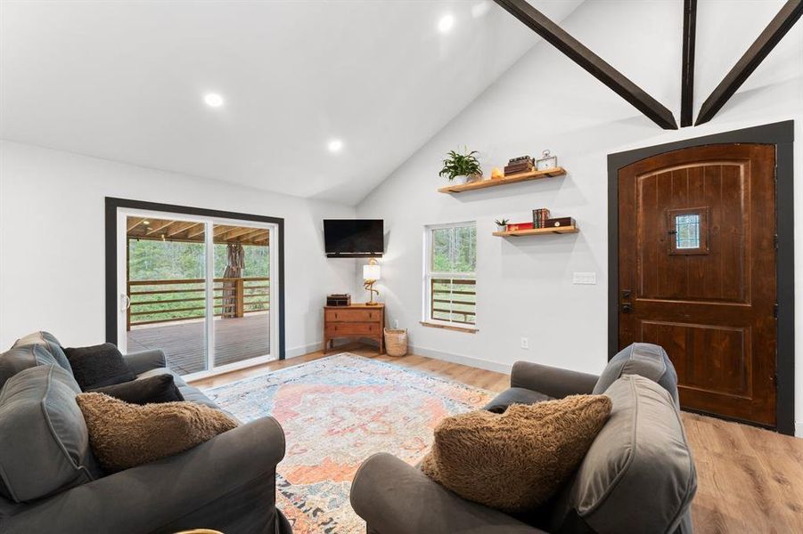 Open living room with cathedral ceiling