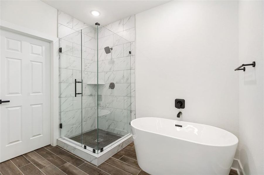 A soaking tub and separate shower give you bathing and relaxation options