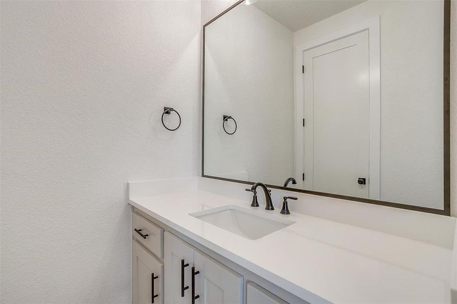 Bathroom featuring vanity