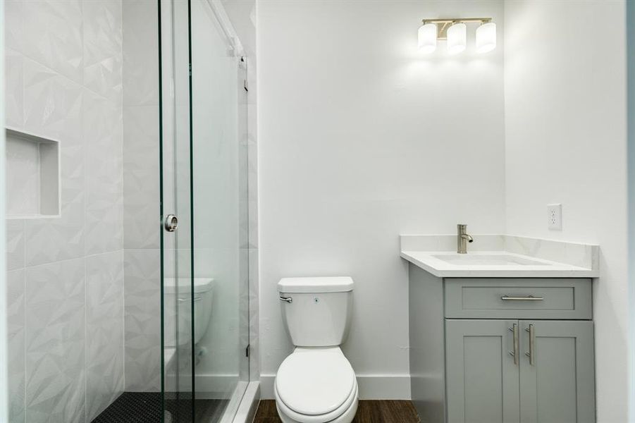 3rd bathroom attached to the bedroom with the balcony.