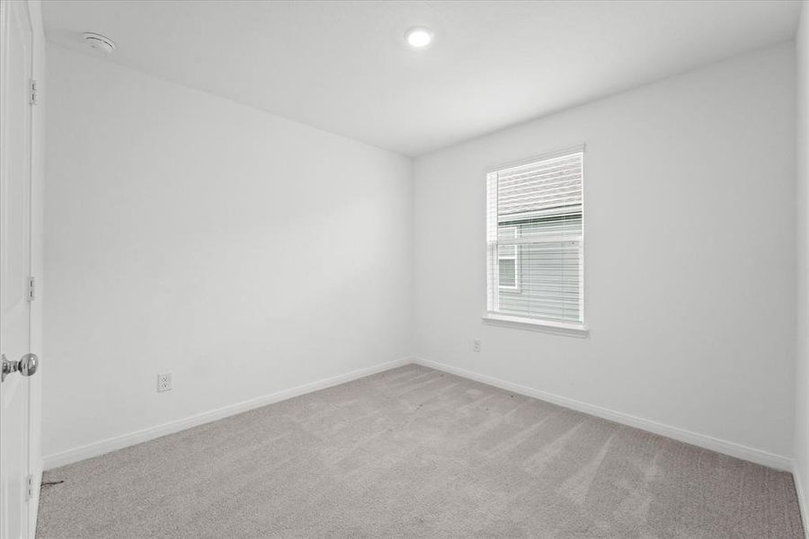 Unfurnished room featuring carpet floors