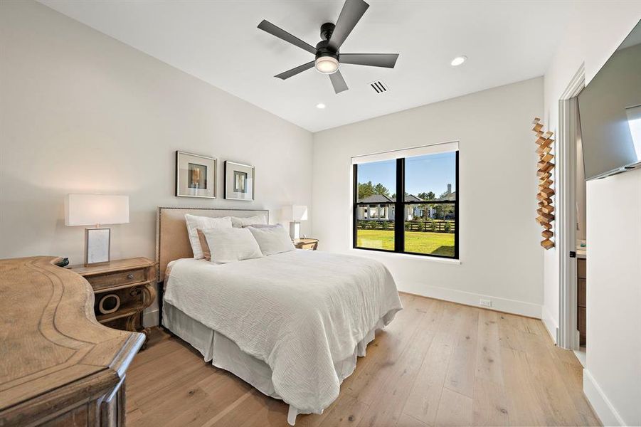 One of the four secondary bedrooms.Each with Custom Built-in closets.