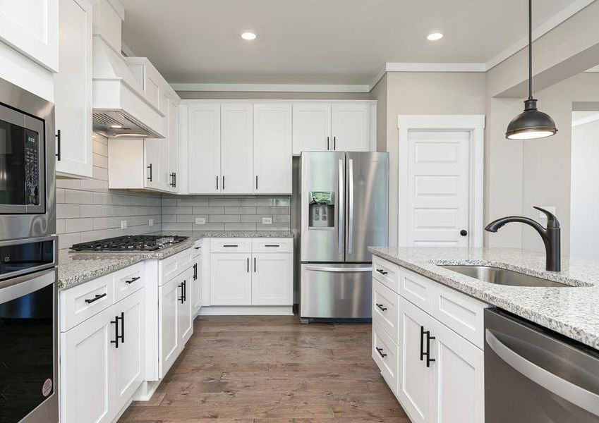 Kitchen with stainless steel appliances.