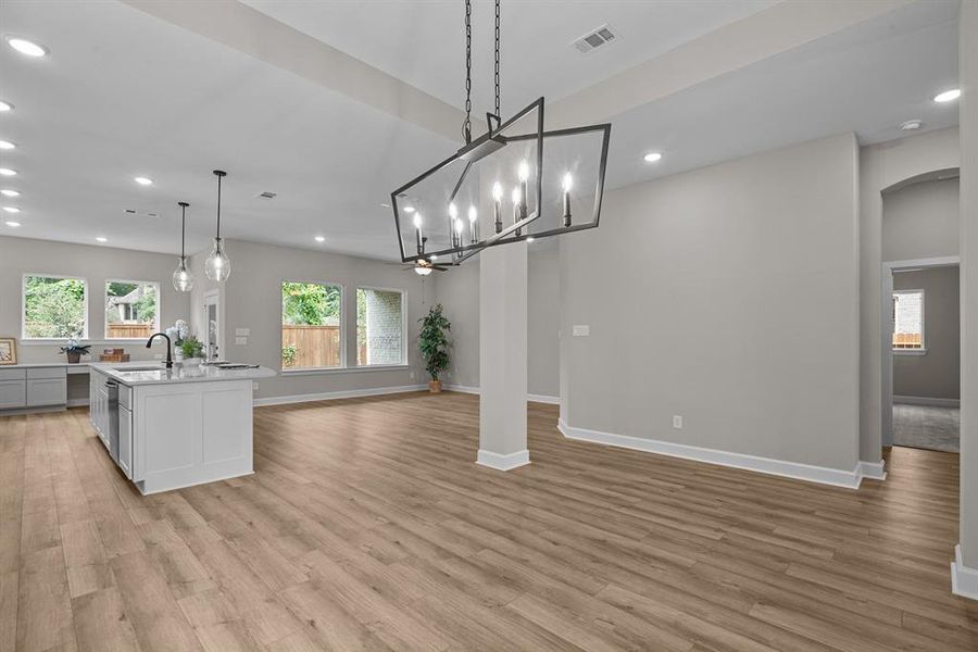 Spacious Living area open to Kitchen with big windows.