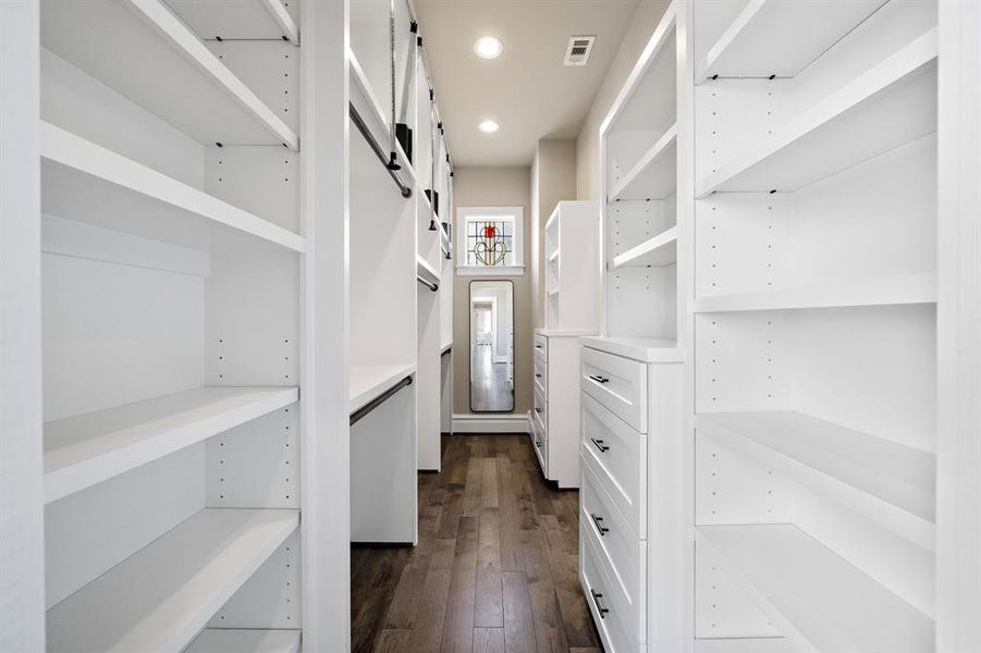 Custom built walk-in closet. And again, stained glass window for natural light, but maintains privacy!