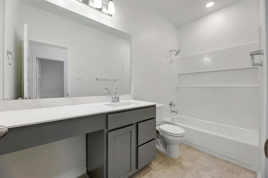 Conveniently located second bathroom serving bedrooms 2 and 3, offering privacy and accessibility for all.