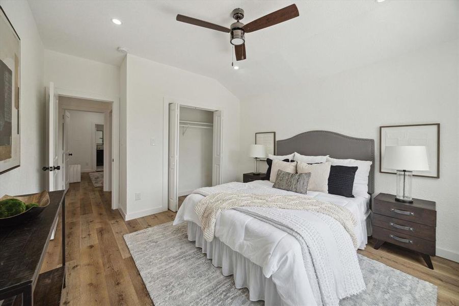 An alternate view of the spacious guest bedroom shows plenty of floor space for furniture, games, toys, and more. Family and guests will rest comfortably in this roomy guest bedroom.