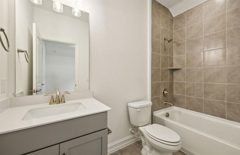 Spacious secondary bathroom*real home pictured