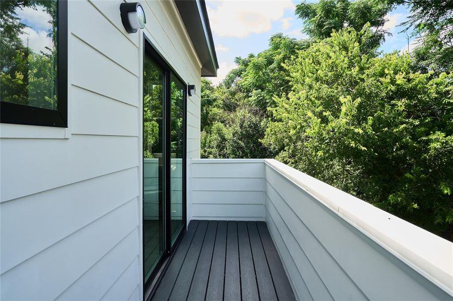 Private deck adjacent to primary bedroom