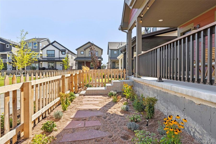 Recently completed hardscaping with Habitat Hero Gold Status from Audubon Rockies w/ native CO plants and French drains.