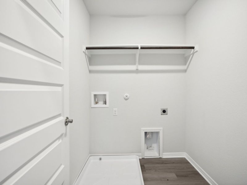The upstairs laundry room helps makes laundry day a breeze.