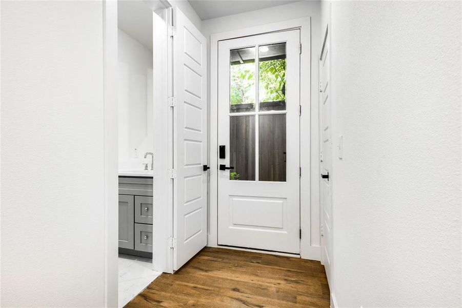 Entryway featuring hardwood / wood-style flooring