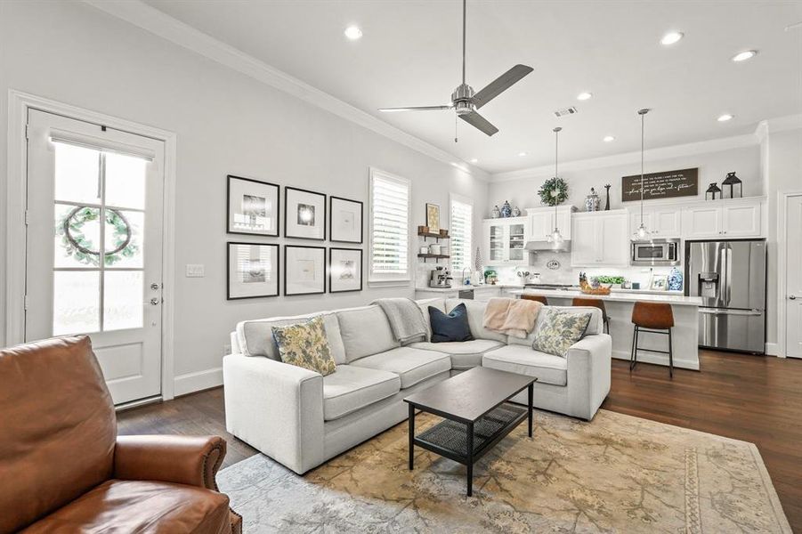 This living room is an entertainer's dream! Direct access to the kitchen where you can be cooking for family and friends all while still being in the center of all of the action!