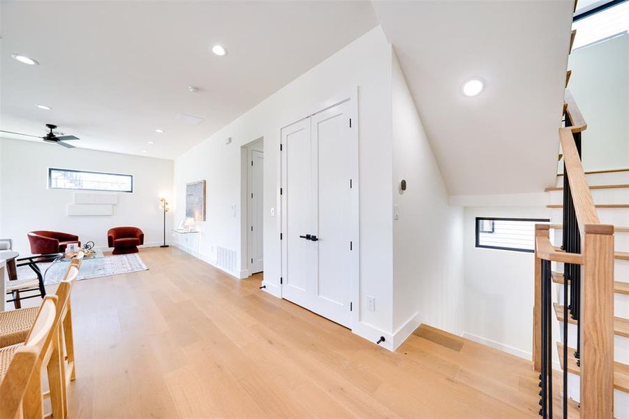 Corridor featuring light hardwood / wood-style flooring