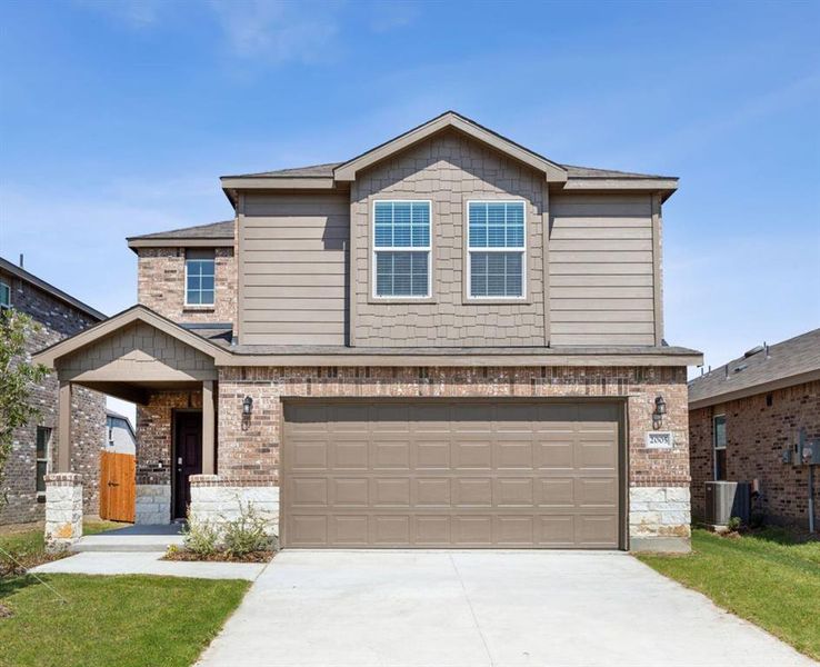 NEW CONSTRUCTION: Beautiful two-story home available at Arbordale in Forney