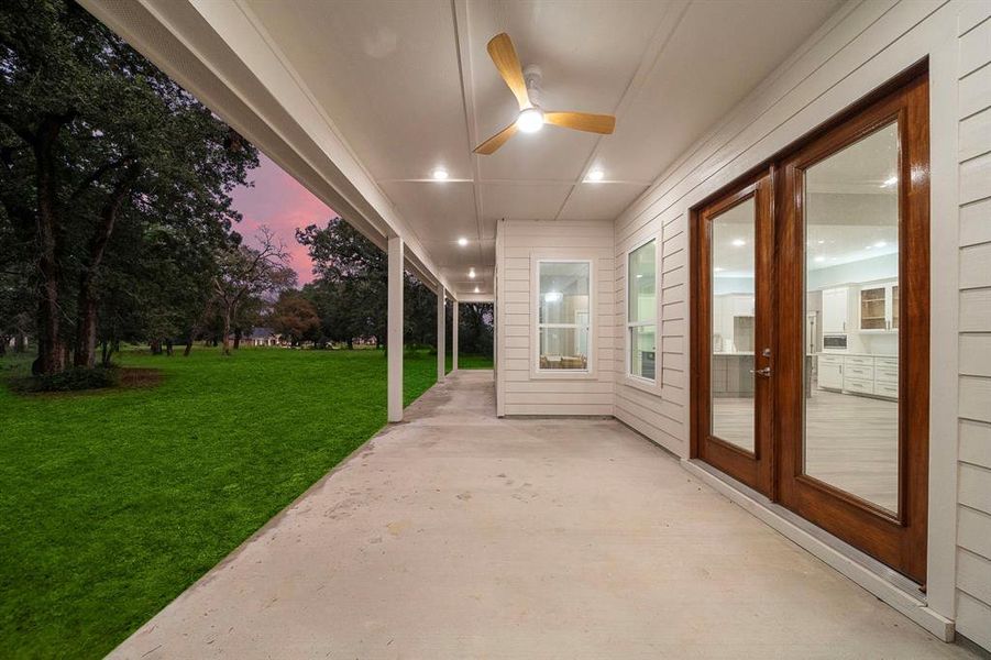 Everyone comments on this gorgeous ceiling fan! All the lights on the back porch make it a great place to relax in the evening.