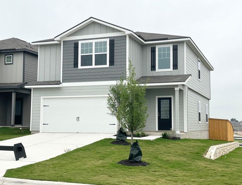 The two-story, five-bedroom Torres plan has it all! A covered front porch greets you and as you step inside, you instantly feel at “home”. Upgrades such as WI-Fi enabled garage door opener with ability to link to Amazon Key, programmable thermostat and blinds at game room window are just a few of the remarkable upgrades that come standard in this new construction home.