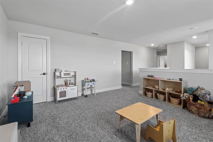 Playroom featuring carpet floors