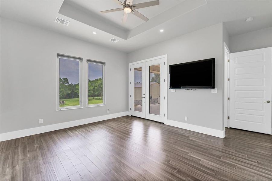 Primary Suite with French doors to backyard patio