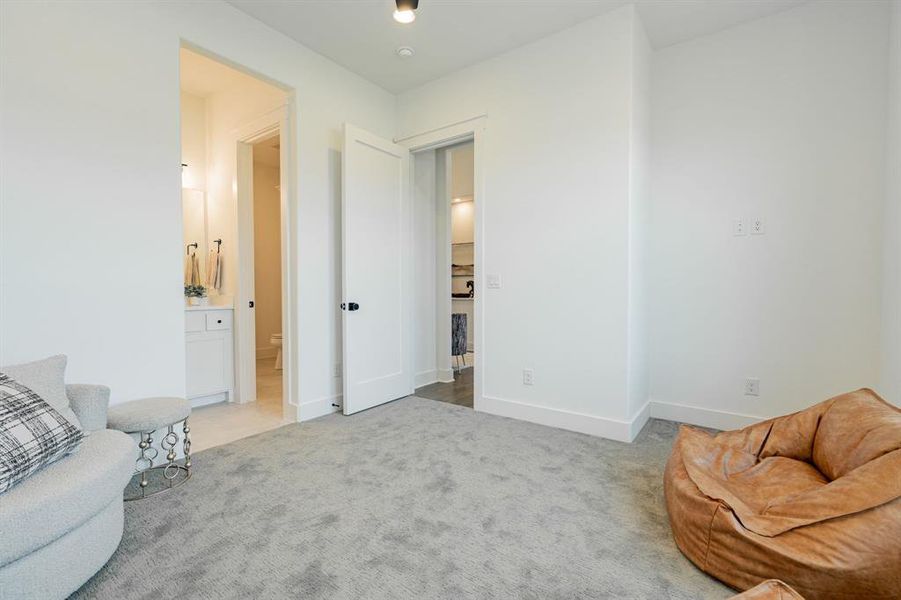 Bedroom featuring carpet flooring