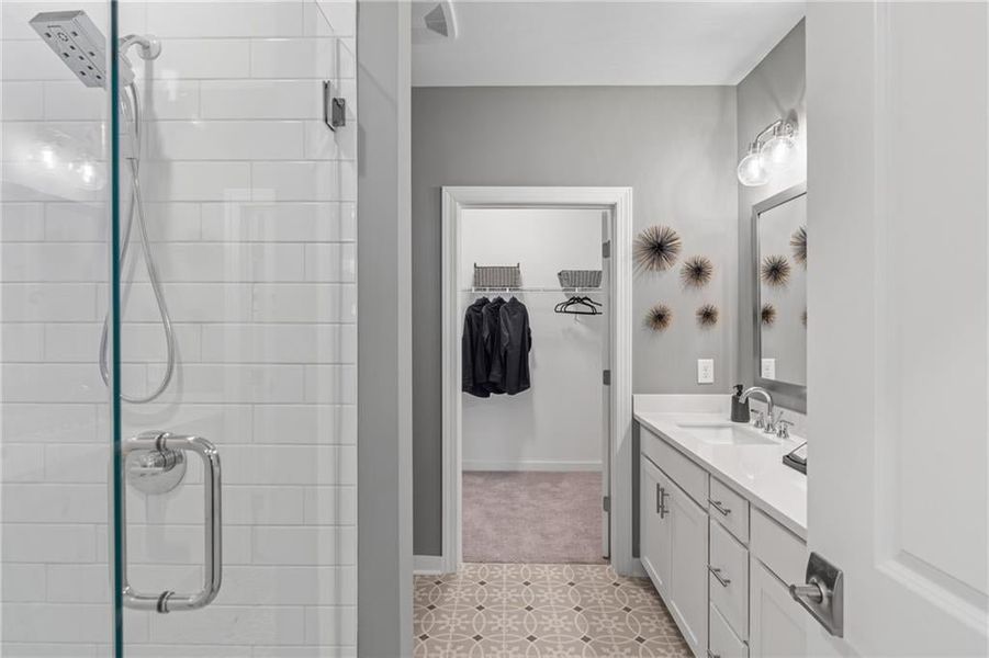 Walk in primary bath with dual vanity and stand up shower!
*Model Home-Representative purposes only*